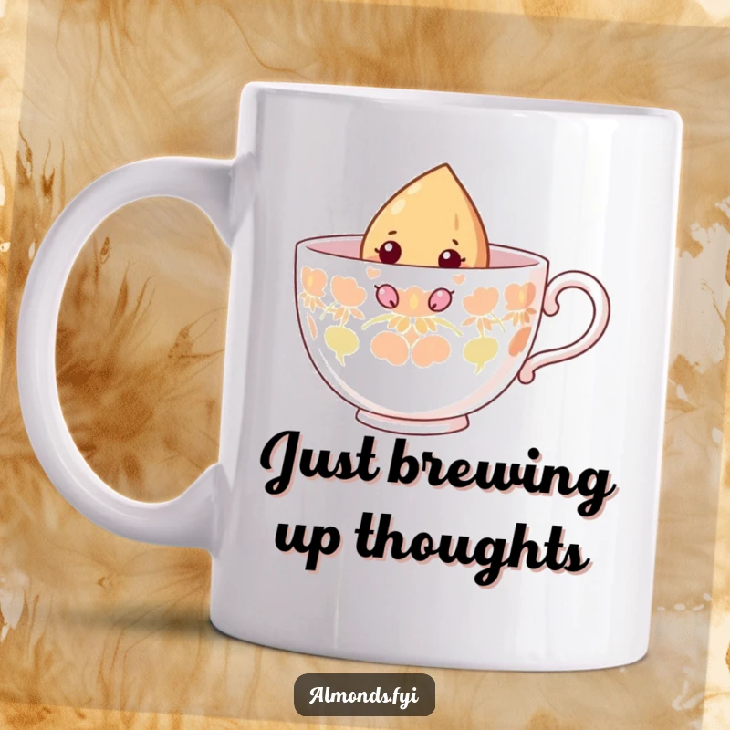 Funny mug showing a curious almond character peeking out from the rim of a very large teacup, full of wonder.