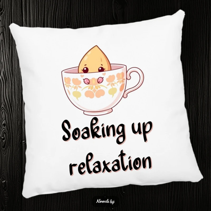 Funny pillow showing a curious almond character peeking from inside a large teacup, perfect for adding comfort and charm.