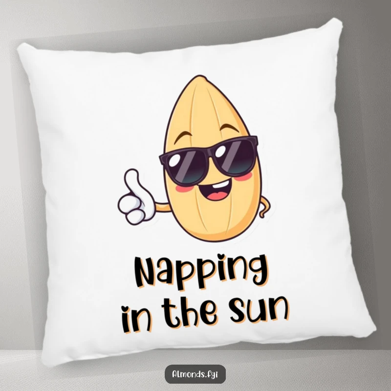 Funny pillow with a cheerful almond in sunglasses giving a thumbs up, providing comfort and nutty cheer for your home.