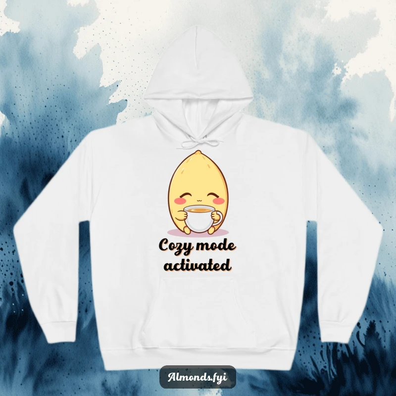Funny hoodie featuring a contented almond character with closed eyes, peacefully sipping a tiny cup of tea, perfect for cozy relaxation.